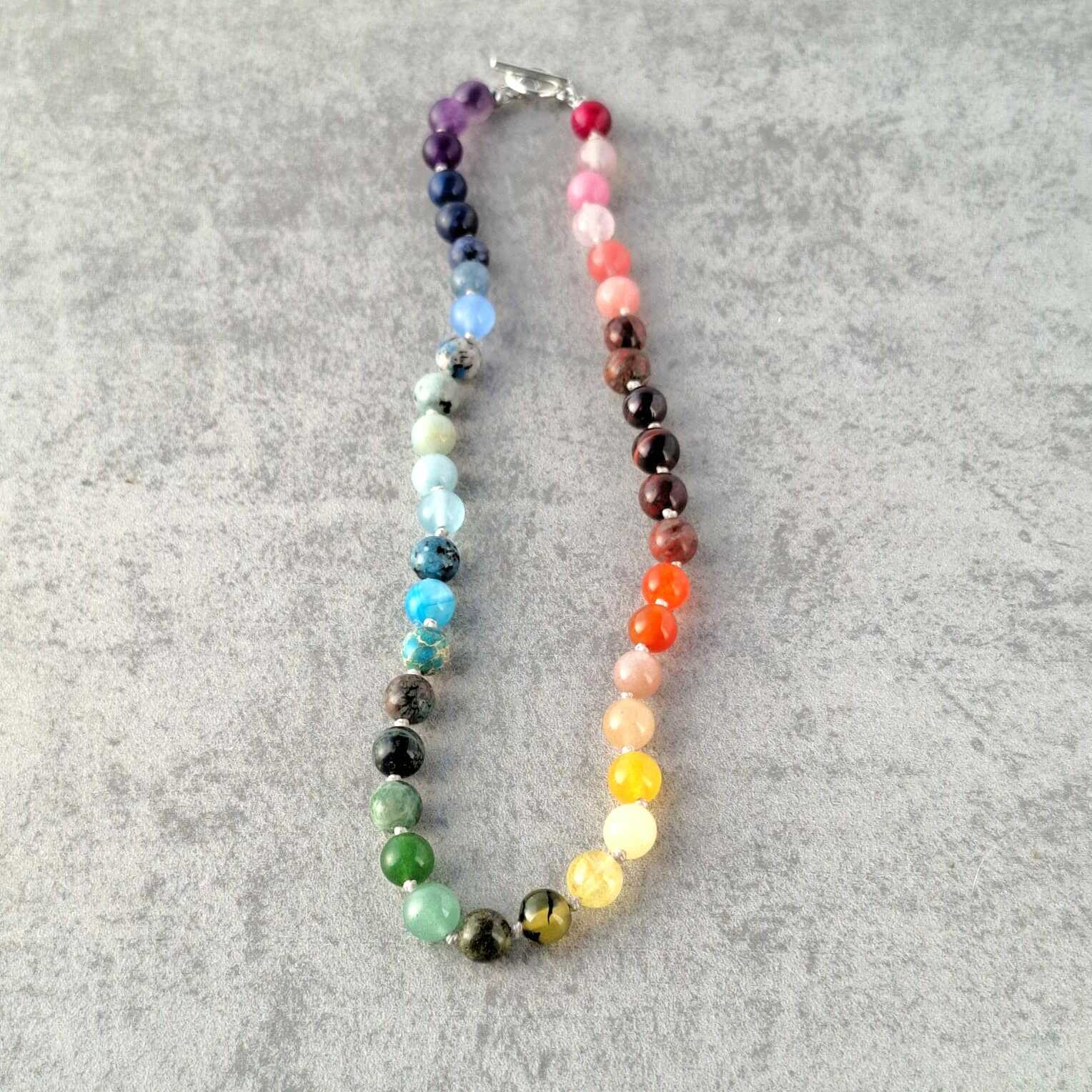 צ'וקר אנרגטי צבעי קשת 9 אבני חן לחיוניות תשוקה שפע ואיזון אנרגטי משלוח לכל הארץ