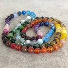 מאלה עם מגוון אבני חן לכל צבעי הקשת, לסמלי חיבור ואיזון