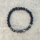 צמיד לגבר עם אבנים שחורים להגנה ועין הרע