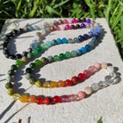 שרשרת מאלה מלאת אבני חן טבעיות לעידוד יצירתיות, שפע, אהבה עצמית ולהגנה אנרגטית, עמוקות בלב