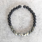 צמיד אבן לבה פיריט וג'ספר דלמטיאן לשפע כלכלי ואנרגיה חיובית