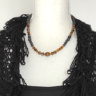 שרשרת אבני חן טבעיות עין הנמר ולבה שחורה תכשיט רוחני בעבודת יד לאומץ ונחישות