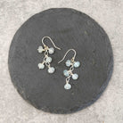 עגילי כסף 925 בעבודת יד עם אקוומרין תכלת לבהירות תקשורת אותנטית והרגעה