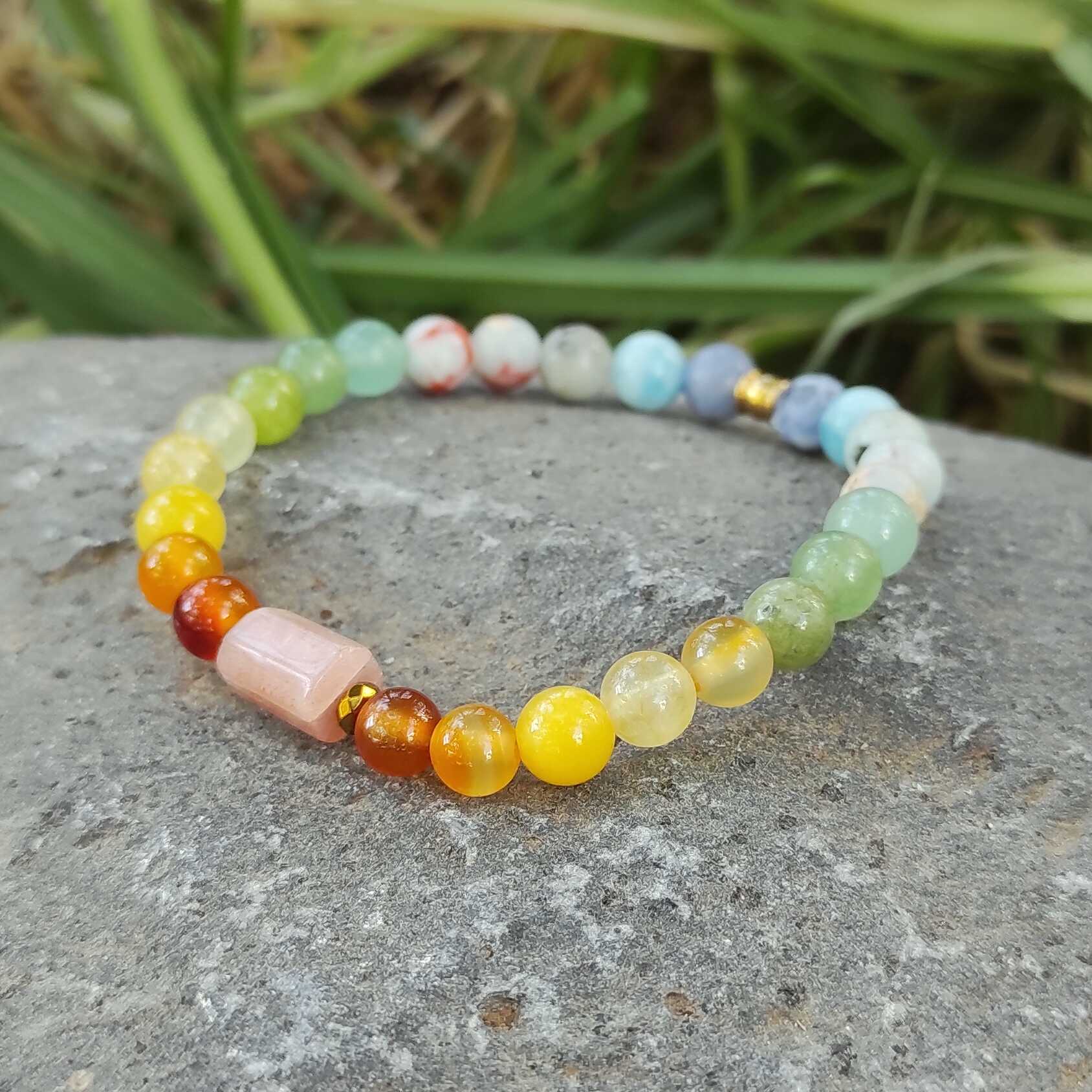 צמיד סאנסטון בגווני פסטל ורוד וכתום לאופטימיות ושמחת חיים