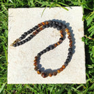 צ'וקר עין הנמר ואבן לבה שחורה אבני ריפוי למוטיבציה יציבות וכוח התמודדות